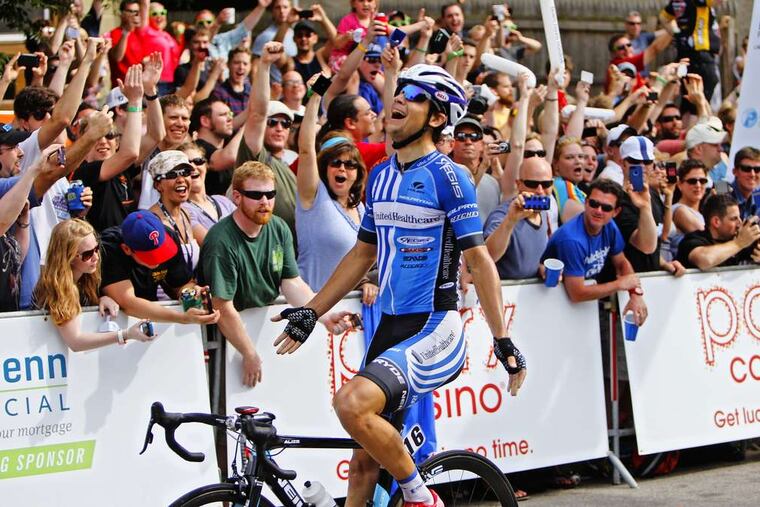PHOTOS: DAVID MAIALETTI / STAFF PHOTOGRAPHER Kiel Reijnen (above) celebrates after winning men's race while Evelyn Stevens (left) hugs teammate Tayler Wiles after finishing first in women's event.