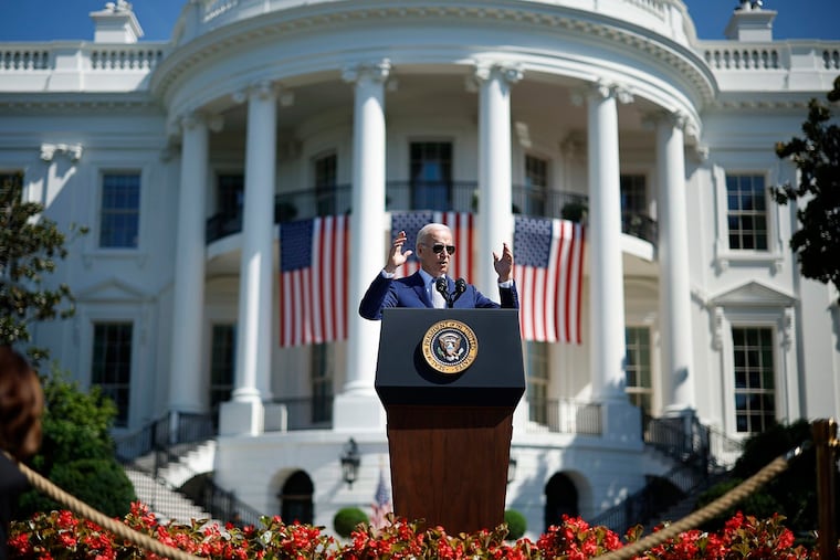 President Joe Biden speaks on the South Lawn of the White House.