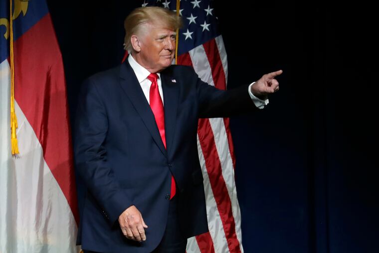 Former President Donald Trump acknowledges the crowd as he speaks at the North Carolina Republican Convention on Saturday in Greenville, N.C.