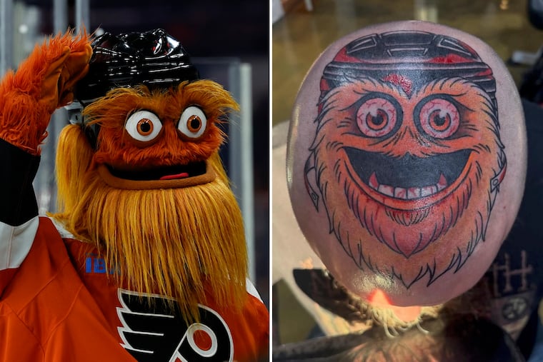 Flyers mascot Gritty (left) and a likeness of him tattooed into the top of Willie Aston's head.