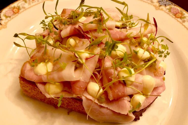 Shaved veal and pork belly on seeded rye at Royal Boucherie.