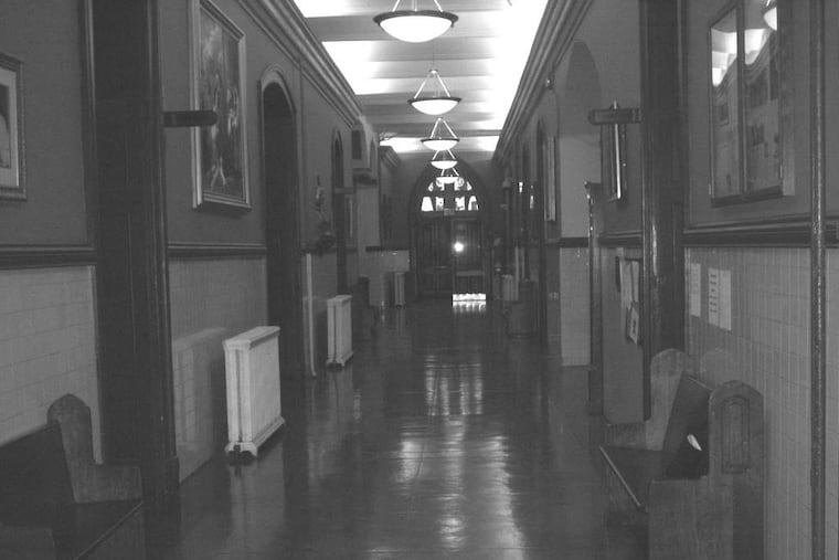 First-floor hallway at Phila.’s Roman Catholic High School. Fourteen boys who walked these halls died in the Great War.