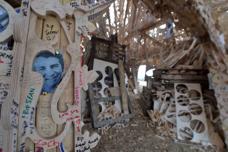 Inscriptions , mementos, and photographs were left in the timber temple before its demise.