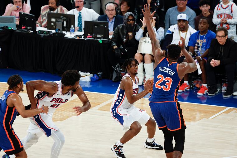NBA officials say Tyrese Maxey traveled before converting a four-point play late in Game 5 to spark a Sixers win.