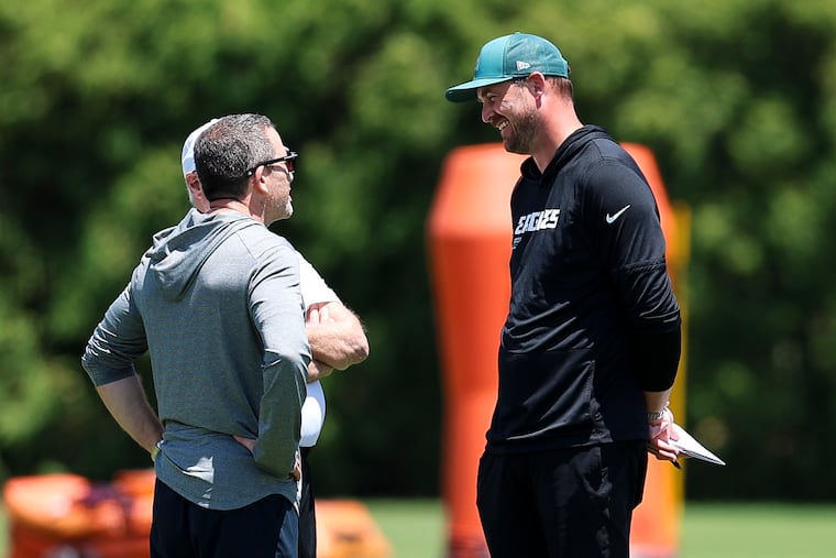 Sean Mannion (right) is entering his first season as Eagles offensive coordinator.