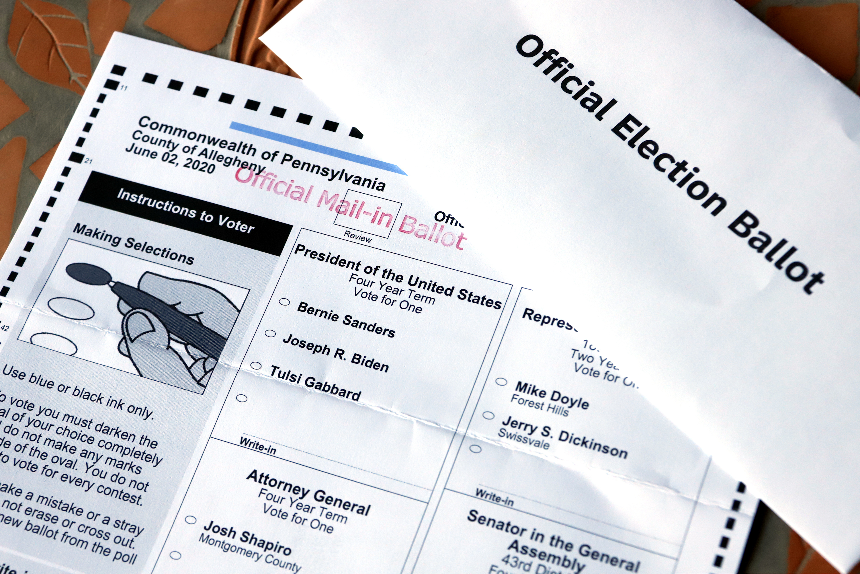 An Official Democratic General Primary mail-in ballot and secrecy envelope, for the Pennsylvania primary in Pittsburgh. Amid the global pandemic, more people than ever are expected to bypass their polling place and cast absentee ballots for the first time. Voters marking ballots from home could lead to an increase in the kinds of mistakes that typically would be caught by a scanner or election worker at the polls.