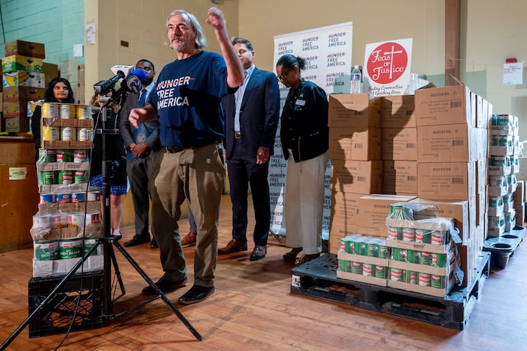 Joel Berg, CEO of the nonprofit hunger relief organization Hunger Free America speaks at the Feast of Justice Food Pantry Tuesday, Aug. 11, 2026.