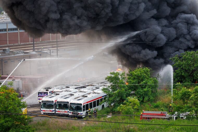 The Philadelphia Fire Department battling a fire at SEPTA's Roberts yard in June, as seen from nearby Roosevelt Boulevard.