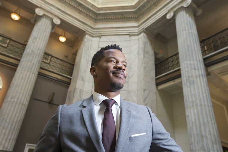 Excitement over the new film, "Birth of a Nation," has been tempered by lingering questions over its director, Nate Parker, and rape charges from his time at Penn State. He was charged but acquitted in 2000. He is shown at the Ritz Carlton on Sept. 13, 2016.