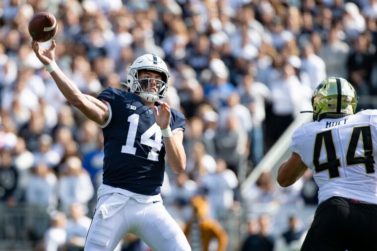 Penn State quarterback Sean Clifford (14) passes over Purdue linebacker Ben Holt (44) in the second quarter.