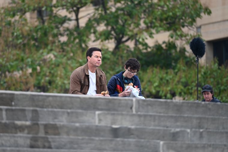 Actors Mark Wahlberg and Indie DesRoches were at the Philadelphia Art Museum Sunday. The duo are in town to film a movie about a father and son on a road trip to see NBA teams.