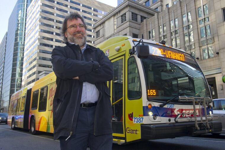 Alex Doty, 49, of West Philadelphia, shown at the bus stop on the corner of 18th Street and JFK Boulevard in Center City, is trying to start a riders' union that will advocate for transit in the city.