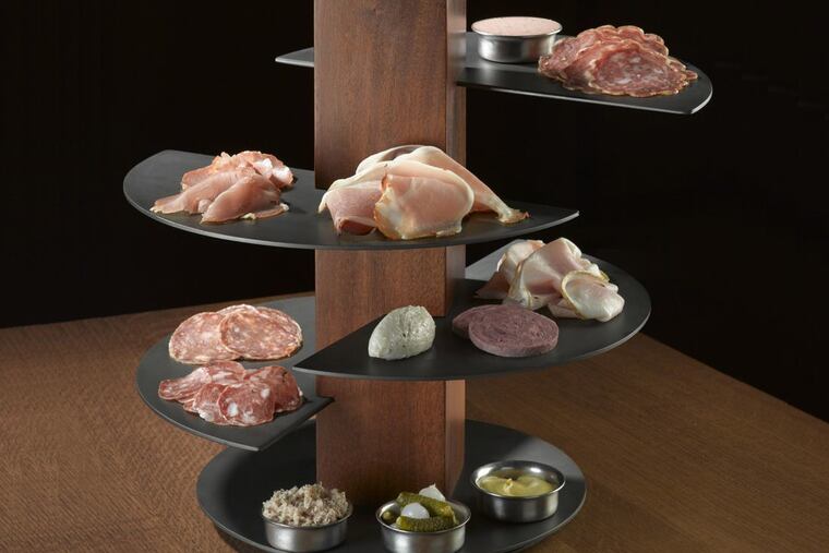 A charcuterie tower by Artifaqt.