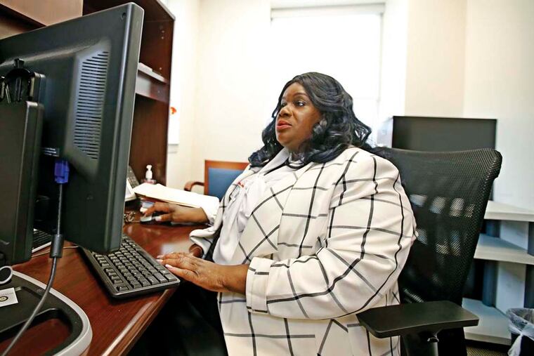 Annette Reeves, who lost her house after years of unemployment, started a full-time job again in July. MICHAEL BRYANT / Staff Photographer