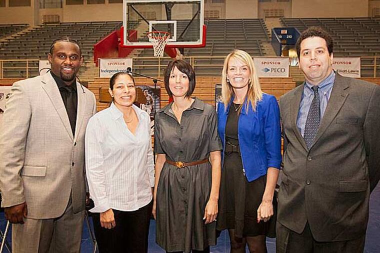 The Big Five inducted 5 stars into its hall of fame today in a ceremony held at Penn's Palestra. The five (left to right) are Saint Joseph's Marvin O'Connor, Saint Joseph's Angela Zampella, Temple's Jen Ricco, Villanova's Trish Juhline and Andy Jasner, representing his late father Phil Jasner. (Ed Hille/Staff Photographer)