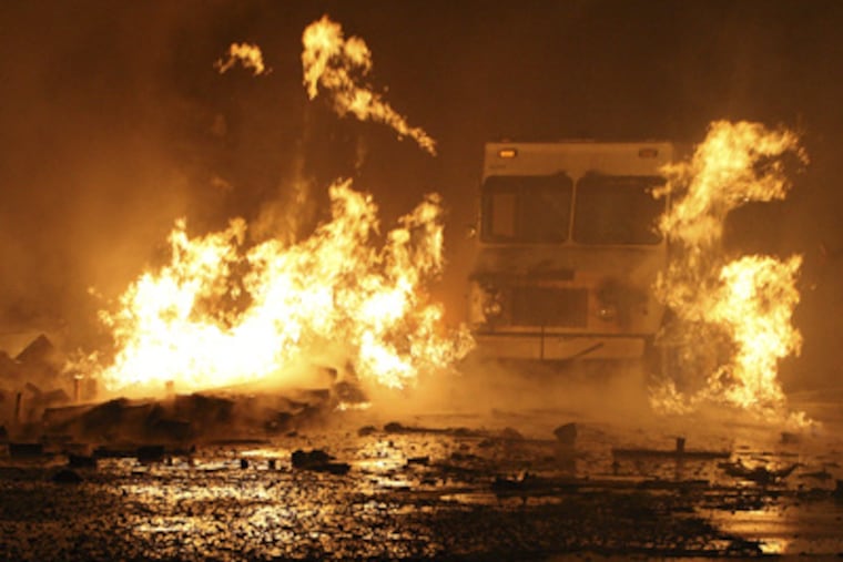 A gas explosion occurs at 6900 Torresdale Avenue on Tuesday. (Steven M. Falk / Staff Photographer)