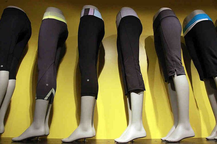 A line of workout pants at Lululemon, which has four stores in the Philadelphia area. Lycra makes the elastic fiber that gives athletic and performance wear a certain stretch-quality.
