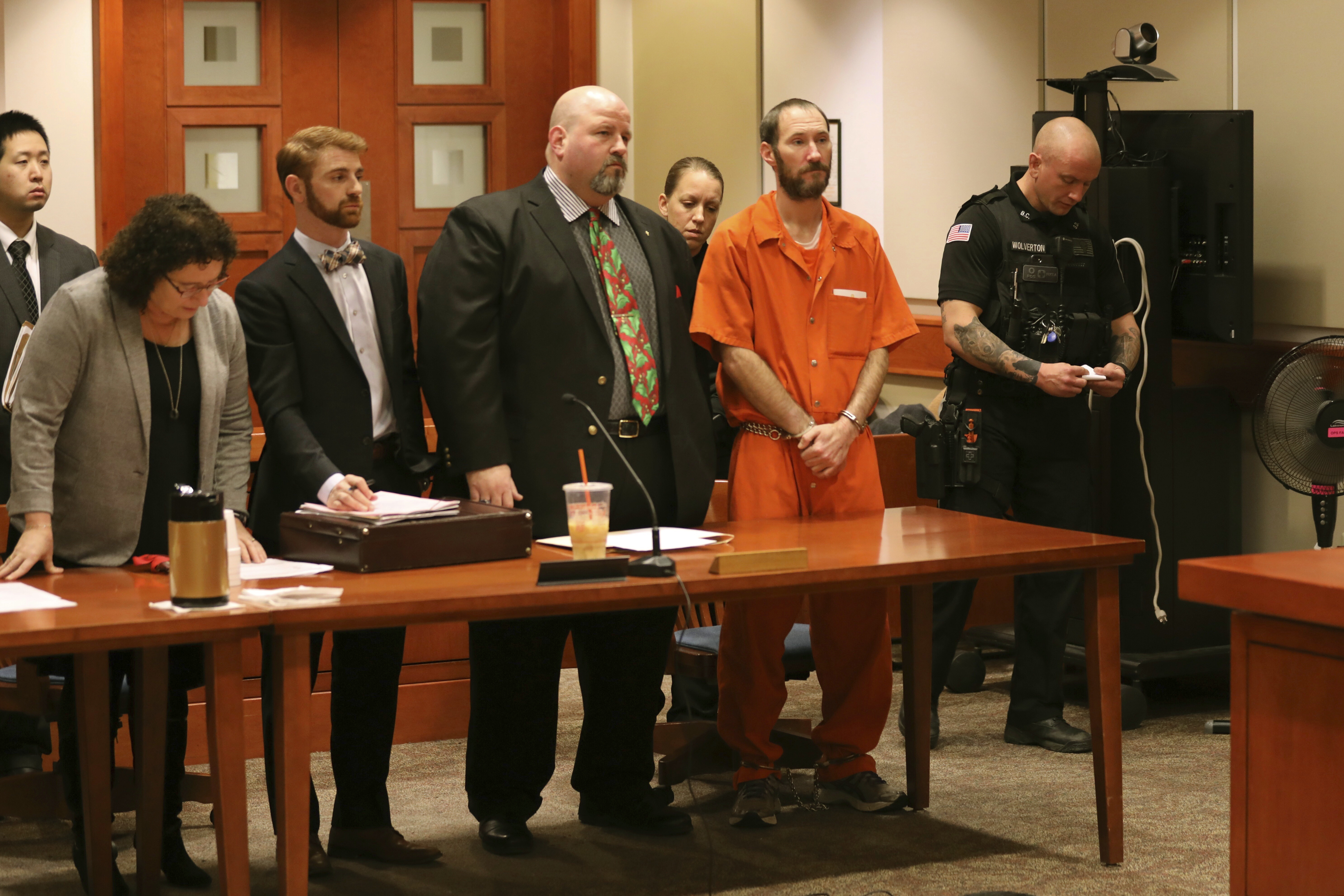 Johnny Bobbitt stands during a hearing Burlington County Courthouse in Mt. Holly, N.J. on Friday Dec. 14, 2018. Bobbitt will be released from county jail and live in his apartment in Philadelphia. Prosecutors say Bobbitt conspired with Katelyn McClure and her former boyfriend, Mark D'Amico, to concoct a feel-good story about Bobbitt giving McClure his last $20 when her car ran out of gas. They raised $400,000, which authorities say was spent on luxury items and casino trips. (David Swanson /The Philadelphia Inquirer via AP, Pool)