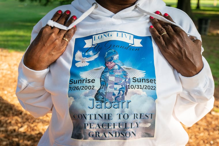 Joyce Clark wears a sweatshirt in memory of her grandson, Jabarr Richards, who was killed in October 2022.