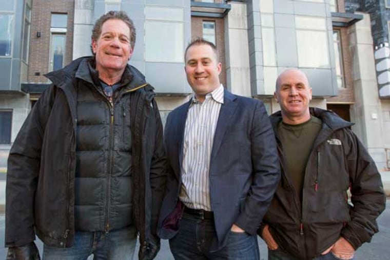 ( L - R ) Harvey Ostroff,Noah Ostroff, and Mickey Murray in front of their homes in process at19th and Lombard