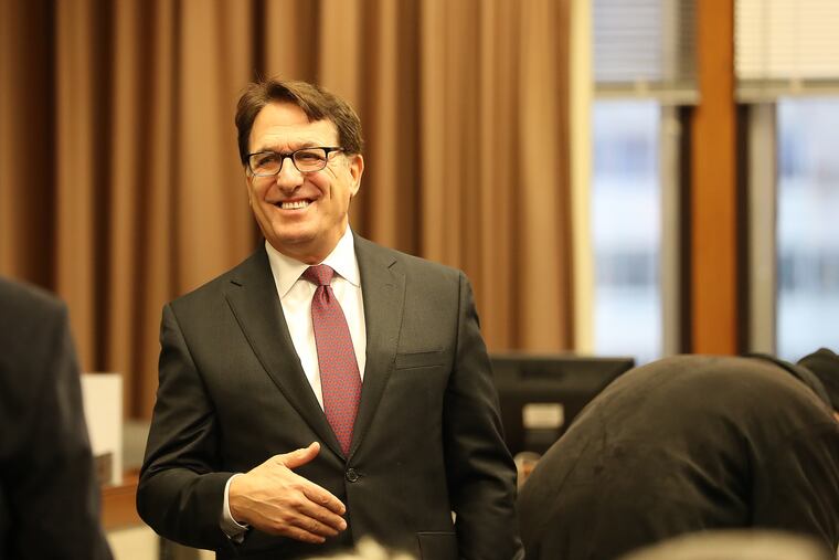 Developer Bart Blatstein waits for the start of the Philadelphia zoning board hearing for his proposed plan for a Wawa gas station in Philadelphia on Nov. 12, 2019.