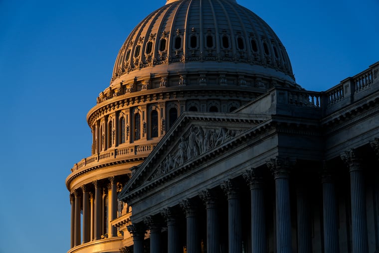 FILE - Sunrise at the U.S. Capitol, Monday, Dec. 19, 2022 in Washington. The House and the Senate are set to pass an overhaul of the Electoral Count Act, the arcane election law that then-President Donald Trump tried to subvert after his 2020 election defeat. Democrats and Republicans have been working on the legislation since the Jan. 6, 2021, insurrection at the Capitol, where Trump supporters echoing his false claims of widespread election fraud interrupted the congressional certification of Democrat Joe Biden’s victory.