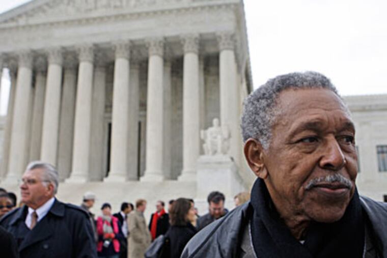 Otis McDonald, one of four plaintiffs in the Chicago handgun ban takes part in a news conference in front of the Supreme Court in March. (AP Photo/Haraz N. Ghanbari)