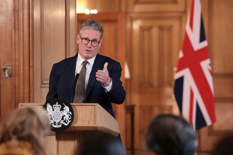 British Prime Minister Keir Starmer delivers a speech, following his first cabinet meeting as prime minister, after his Labour Party won a landslide victory in recent elections.