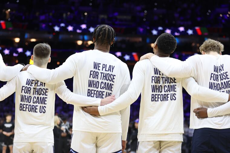 Villanova's current men's basketball team honored its 1985 national championship squad during Friday's win over Providence, including with warmup shirts that read "WE PLAY FOR THOSE WHO CAME BEFORE US."