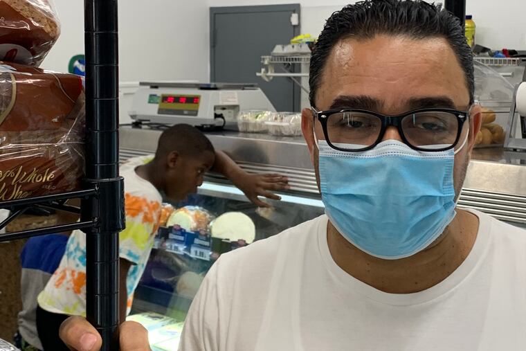 Miguel Peralta, owner of the Corner Market near Temple Medical School