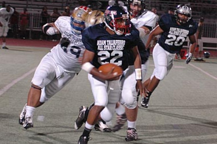 Willingboro's Matt Dash (22) turns the corner for a big gain during the Adam Taliaferro All-Star Classic. (Marc Narducci/Staff)