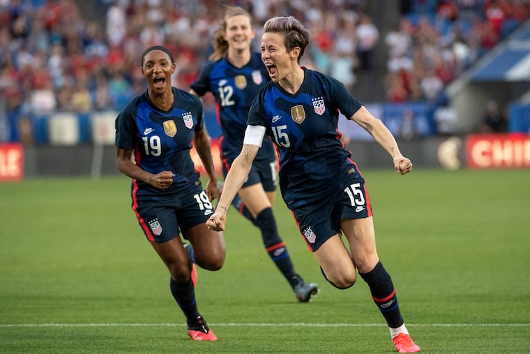 U.S. women's soccer star Megan Rapinoe, right, has been a leader of the U.S. women's soccer team's activism on many issues.