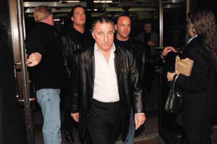 Reputed mob boss Joseph Ligambi, center, as seen leaving federal court in 2001. Audio tapes by a witness, who since committed suicide, are expected to be played in the racketeering case against Ligambi. (Alejandro A. Alvarez / Staff Photographer)