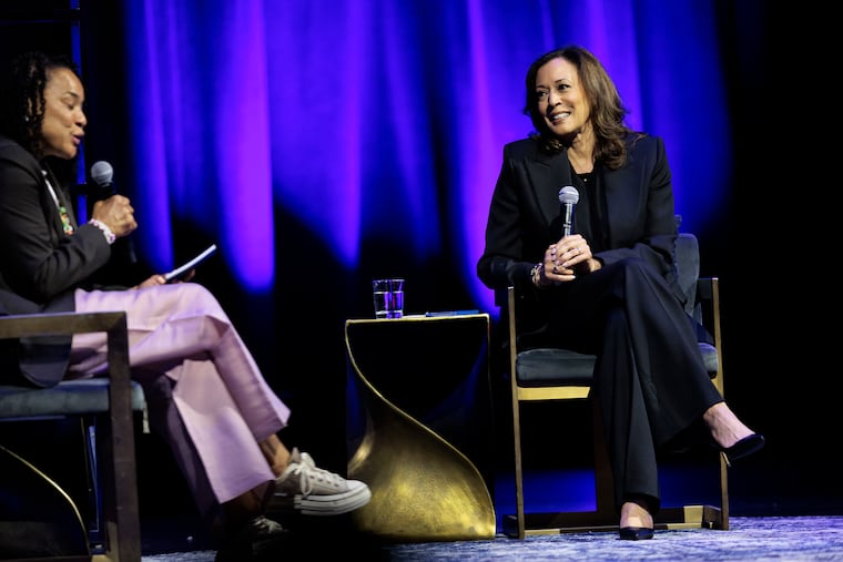 Former Vice President Kamala Harris speaks with Dawn Staley, (left) while promoting her new book “107 Days” at the Met Philadelphia on Thursday, Sept. 25, 2025. The event was held in partnership with Uncle Bobbie’s Coffee & Books.