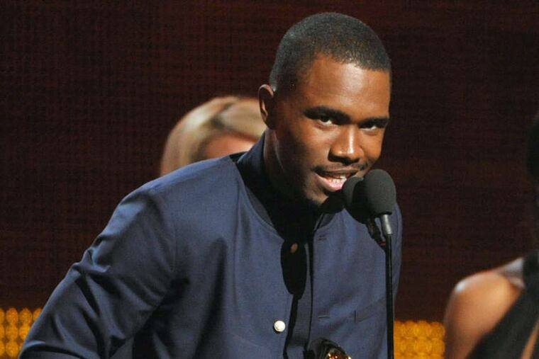 PHOTOS: ASSOCIATED PRESS Frank Ocean accepts the award for best urban contemporary album .