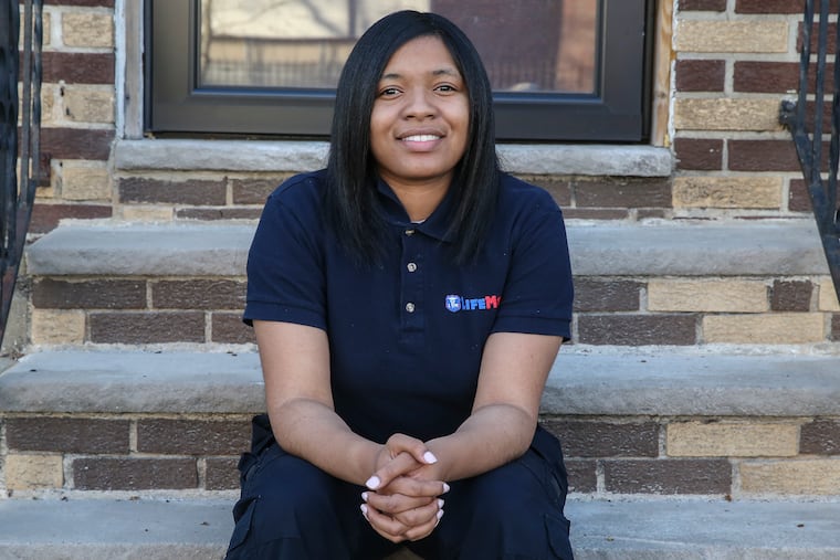 Dominique Johnson is an EMT now in her new job. Tuesday, April 13, 2021.