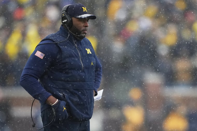 Michigan coach Sherrone Moore watches from the sideline during the game against Ohio State on Nov. 29.