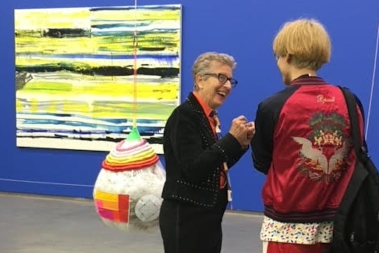 Ms. Fishman (left) enjoyed sharing and talking about art, especially with students.