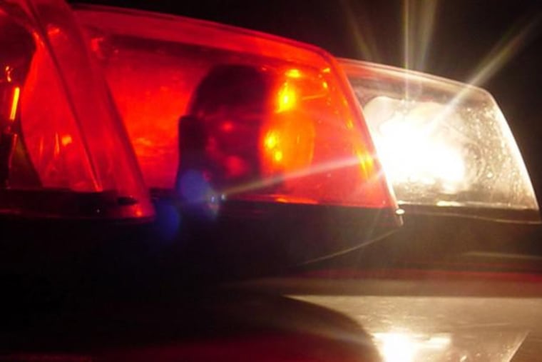 The police found a woman with a gunshot wound to the head in a second-floor apartment.