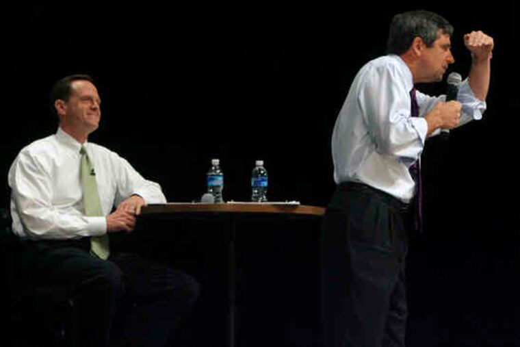 Two Senate candidates , Republican Pat Toomey (left) and Democrat Joe Sestak, at a town hall in Allentown yesterday.