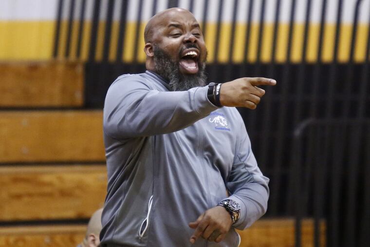 Westampton Tech coach Cetshwayo Byrd makes a point to one of his players during an East Coast Showcase game in 2017.
