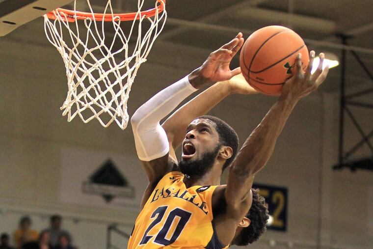 B.J. Johnson of La Salle scores in the 2nd half of their game against Rhode Island on Feb. 20, 2018 at the Tom Gola Arena. Johnson finished with 31 points and 24 rebounds. CHARLES FOX / Staff Photographer