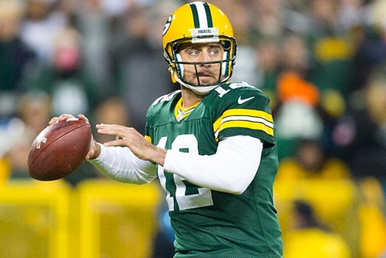 Green Bay Packers quarterback Aaron Rodgers (12) throws a pass during the first quarter against the Chicago Bears at Lambeau Field. (Jeff Hanisch/USA Today)