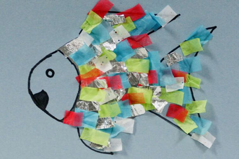 A brightly-colored fish craft made alongside reading "The Rainbow Fish" can help teach kids about friendship. (Paul Tople/Akron Beacon Journal/MCT)
Crafty Kids column (CRAF19F).