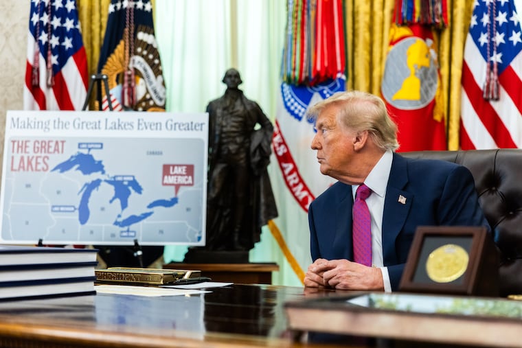President Donald Trump takes a question from a reporter after signing an executive order to change the name of Lake Ontario to Lake America in the Oval Office on Thursday. Trump said the U.S. government had “filed all the necessary papers, documents,” and that the name change would take effect immediately.
