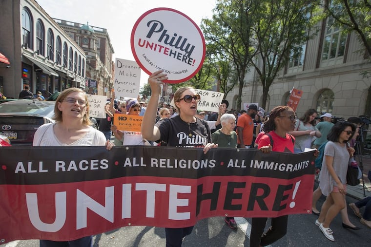A protest rally outside the Philadelphia offices of the Justice Department. The group marched along Chestnut Street to the Federal Detention Center at Eighth and Arch Streets.