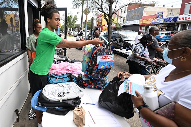 Mica Dickerson, provides new backpacks and school supplies for local residents on Wednesday, August 17, 2022.
