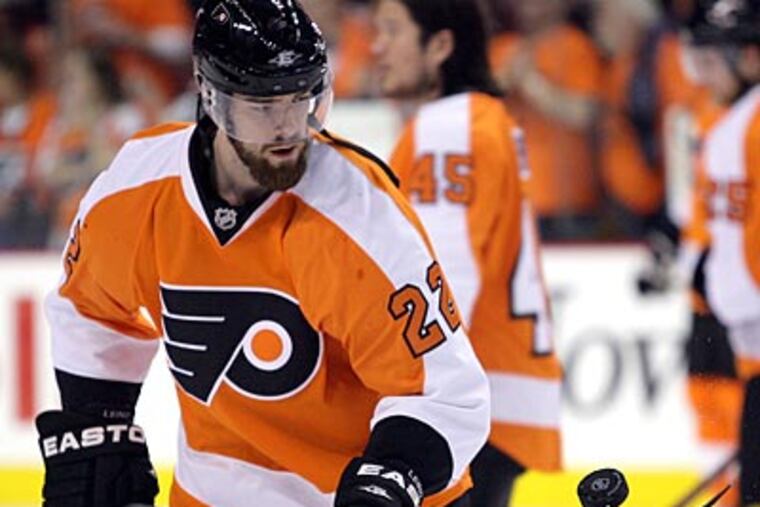 Forward Ville Leino said he will be on crutches for two more weeks following surgery on his hip. (Yong Kim / Staff Photographer)