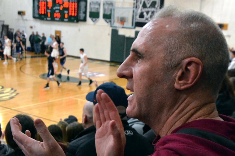 St. Joseph's assistant coach Dave Duda cheers on his son David's Methacton team.