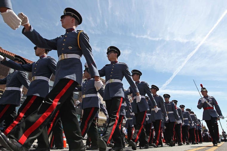 Members of B Company Infantry Unit from Valley Forge Military Academy march on Lancaster Avenue during the Memorial Day Parade in Radnor.